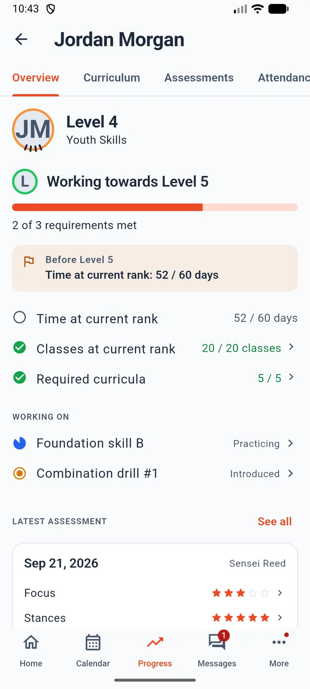 A child's progress screen: 2 of 3 requirements met for the next level, time at current rank, classes at current rank, required curricula, skills in progress, and the latest instructor assessment